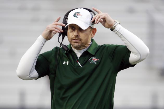 UAB head coach Bill Clark pulls on his headset in the second half of the NCAA Conference USA championship college football game against Middle Tennessee Saturday, Dec. 1, 2018, in Murfreesboro, Tenn. UAB won 27-25. (AP Photo/Mark Humphrey)