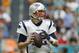 MIAMI, FL - DECEMBER 09: Tom Brady #12 of the New England Patriots throws a pass against the Miami Dolphins at Hard Rock Stadium on December 9, 2018 in Miami, Florida. (Photo by Michael Reaves/Getty Images)