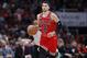 Chicago Bulls guard Zach LaVine brings the ball up court against the Golden State Warriors during the second half of an NBA basketball game, Monday, Oct. 29, 2018, in Chicago. (AP Photo/Kamil Krzaczynski)
