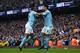 MANCHESTER, ENGLAND - APRIL 07: Ilkay Gundogan of Manchester City celebrates scoring a goal to make the score 2-0 with Raheem Sterling during the Premier League match between Manchester City and Manchester United at Etihad Stadium on April 7, 2018 in Manchester, England. (Photo by Matthew Ashton - AMA/Getty Images)