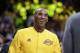 Los Angeles Lakers forward Kobe Bryant smiles to the crowd during a ceremony before Bryant's last NBA basketball game, against the Utah Jazz, Wednesday, April 13, 2016, in Los Angeles. (AP Photo/Jae C. Hong)
