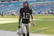 Oakland Raiders wide receiver Martavis Bryant walks off the field after an NFL football game against the Miami Dolphins, Sunday, Sept. 23, 2018 in Miami Gardens, Fla. The Dolphins defeated the Raiders 28-20. (AP Photo/Lynne Sladky)