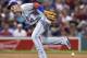 Toronto Blue Jays shortstop Troy Tulowitzki runs past the ball on an RBI single by Boston Red Sox's Dustin Pedroia during the fourth inning of a baseball game at Fenway Park in Boston, Wednesday, July 19, 2017. (AP Photo/Charles Krupa)