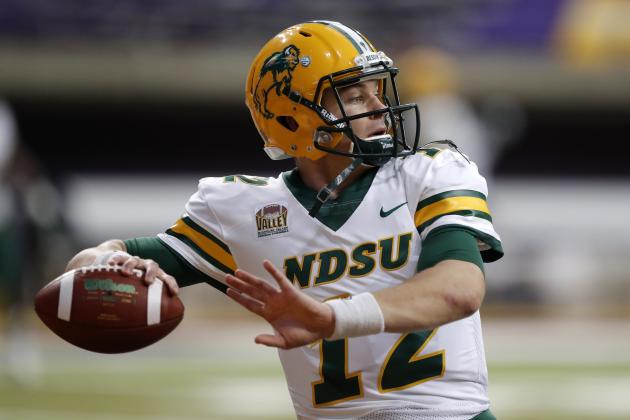 FILE - In this Saturday, Oct. 6, 2018, file photo, North Dakota State quarterback Easton Stick warms up before an NCAA college football game against Northern Iowa, in Cedar Falls, Iowa. North Dakota State quarterback Easton Stick was one of three Bison players selected to The Associated Press FCS All-America team, Tuesday, Dec. 11, 2018. (AP Photo/Charlie Neibergall, File)