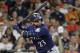 Seattle Mariners' Nelson Cruz (23) bats against the Houston Astros during the third inning of a baseball game Sunday, Aug. 12, 2018, in Houston. (AP Photo/David J. Phillip)