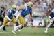 UCLA defensive lineman Jaelan Phillips, right, and linebacker Josh Woods, left, is seen against Texas A&M an NCAA college football game, Sunday, Sept. 3, 2017, in Pasadena, Calif. UCLA won 45-44. (AP Photo/Danny Moloshok)