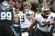 New Orleans Saints' Drew Brees (9) looks to pass against the Carolina Panthers in the first half of an NFL football game in Charlotte, N.C., Monday, Dec. 17, 2018. (AP Photo/Jason E. Miczek)