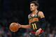 BOSTON, MA - DECEMBER 14: Trae Young #11 of the Atlanta Hawks dribbles against the Boston Celtics during the first quarter at TD Garden on December 14, 2018 in Boston, Massachusetts. (Photo by Maddie Meyer/Getty Images)