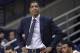 FILE - In this Feb. 7, 2018, file photo, Connecticut head coach Kevin Ollie watches from the sideline during the first half an NCAA college basketball game in Storrs, Conn. Ollie was fired in March amid an NCAA investigation. In response to open records requests from The Associated Press and other news organizations, UConn president Susan Herbst on Monday, June 25, released a June 19 letter upholding Ollie's firing, which said the former men's basketball coach had a pattern of breaking NCAA rules and committed serious violations. (AP Photo/Jessica Hill, File)