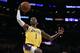 Los Angeles Lakers guard Kentavious Caldwell-Pope attempts a shot during the first half of an NBA preseason basketball game against the Sacramento Kings in Los Angeles, Thursday, Oct. 4, 2018. (AP Photo/Kelvin Kuo)