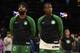 BOSTON, MA - SEPTEMBER 30: Kyrie Irving #11 Terry Rozier #12 of the Boston Celtics look on during the national anthem against the Charlotte Hornets during a preseason game on September 30, 2018 at the TD Garden in Boston, Massachusetts. NOTE TO USER: User expressly acknowledges and agrees that, by downloading and or using this photograph, User is consenting to the terms and conditions of the Getty Images License Agreement. Mandatory Copyright Notice: Copyright 2018 NBAE (Photo by Brian Babineau/NBAE via Getty Images)