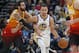 Utah Jazz guard Ricky Rubio, left, fouls Golden State Warriors guard Stephen Curry (30) as he drives up court in the first half during an NBA basketball game Wednesday Dec. 19, 2018, in Salt Lake City. (AP Photo/Rick Bowmer)