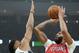 New Orleans Pelicans' Anthony Davis shoots over Milwaukee Bucks' Giannis Antetokounmpo during the first half of an NBA basketball game Wednesday, Dec. 19, 2018, in Milwaukee. (AP Photo/Morry Gash)
