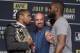 FILE - In this July 6, 2016, file photo, Dana White, center, stands between Daniel Cormier, left, and Jon Jones during a UFC 200 mixed martial arts news conference, in Las Vegas. Daniel Cormier still fights in the shadow of disgraced ex-champion Jon Jones. Cormier defends the UFC light heavyweight championship Saturday, Jan. 20, 2018, in UFC 220 against Volkan Oezdemir. But Cormier must still answer to the fact he has never defeated Jones. (AP Photo/John Locher, File)