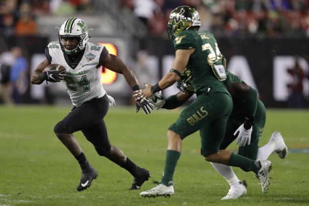 Marshall running back Keion Davis (24) runs against South Florida during the first half of the Gasparilla Bowl NCAA college football game Thursday, Dec. 20, 2018, in Tampa, Fla. (AP Photo/Chris O'Meara)