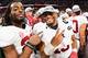 ATLANTA, GA - DECEMBER 01: Tua Tagovailoa #13 of the Alabama Crimson Tide (R) reacts after defeating the Georgia Bulldogs 35-28 in the 2018 SEC Championship Game at Mercedes-Benz Stadium on December 1, 2018 in Atlanta, Georgia. (Photo by Scott Cunningham/Getty Images)