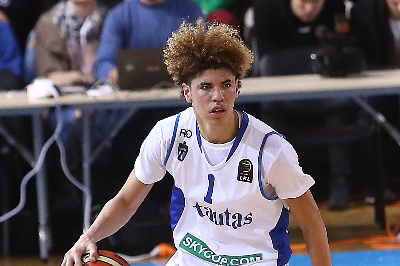 LaMelo Ball, second from left, holds a Spire Institute jersey
