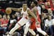 Chicago Bulls' Wendell Carter Jr. (34) works for position as Houston Rockets' Danuel House Jr. defends during the first half of an NBA basketball game Saturday, Dec. 1, 2018, in Houston. (AP Photo/David J. Phillip)