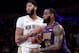 LOS ANGELES, CALIFORNIA - DECEMBER 21: LeBron James #23 of the Los Angeles Lakers guards Anthony Davis #23 of the New Orleans Pelicans during a 112-104 Laker win at Staples Center on December 21, 2018 in Los Angeles, California. NOTE TO USER: User expressly acknowledges and agrees that, by downloading and or using this photograph, User is consenting to the terms and conditions of the Getty Images License Agreement. (Photo by Harry How/Getty Images)