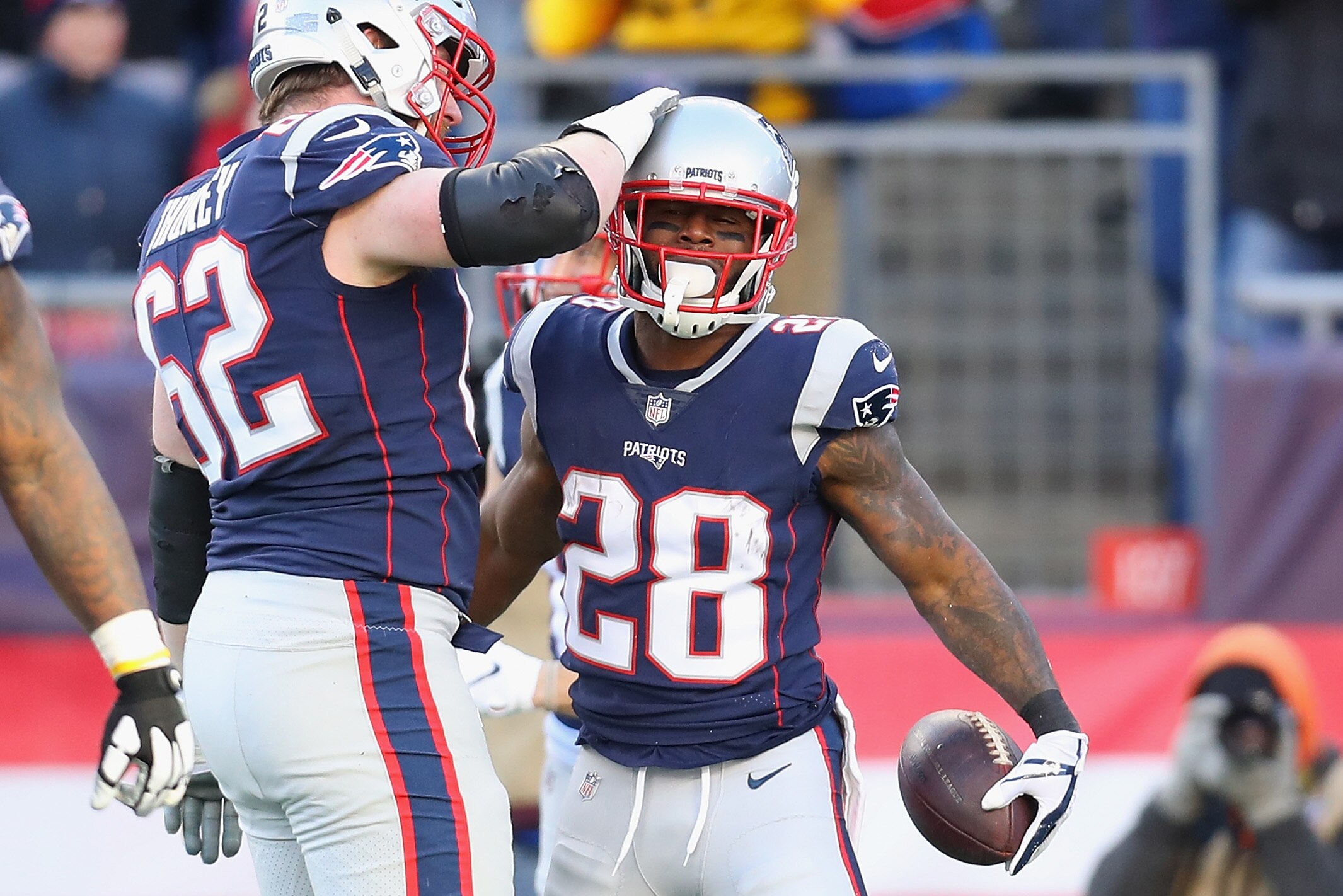 FOXBOROUGH, MA - DECEMBER 23:  James White #28 of the New England Patriots celebrates with Joe Thuney #62 after rushing for a 27-yard touchdown during the second quarter against the Buffalo Bills at Gillette Stadium on December 23, 2018 in Foxborough, Massachusetts.  (Photo by Maddie Meyer/Getty Images)