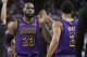 Los Angeles Lakers forward LeBron James (23) high-fives Josh Hart (3) at the end of the first half of the team's NBA basketball game against the Golden State Warriors on Tuesday, Dec. 25, 2018, in Oakland, Calif. (AP Photo/Tony Avelar)
