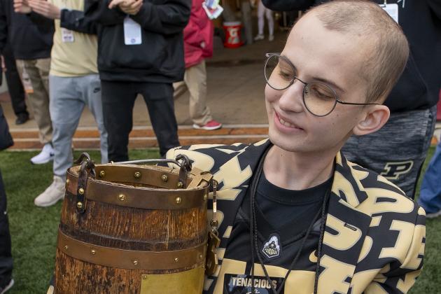 BLOOMINGTON, IN - NOVEMBER 24: Purdue fan Tyler Trent holds the Ol' Oaken Bucket following the game against the Indiana Hoosiers at Memorial Stadium on November 24, 2018 in Bloomington, Indiana. (Photo by Michael Hickey/Getty Images)