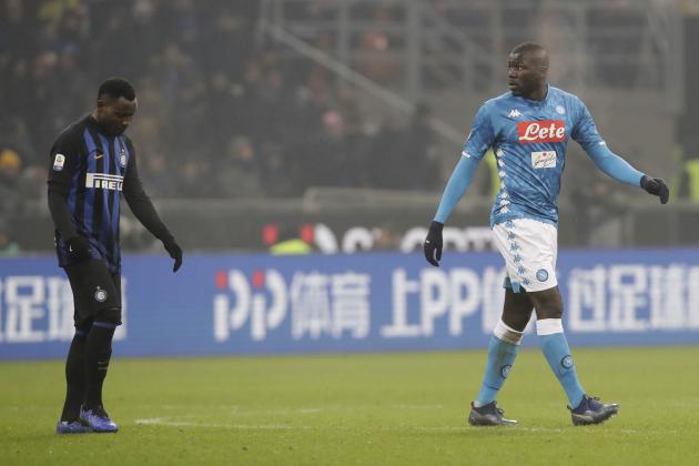 In this image taken on Wednesday, Dec.26, Napoli's Kalidou Koulibaly, right, leaves the pitch after receiving a red card from the referee 2018 during a Serie A soccer match between Inter Milan and Napoli, at the San Siro stadium in Milan, Italy. At left is Inter Milan's Kwadwo Asamoah. Cristiano Ronaldo has come to the defense of Kalidou Koulibaly after the Napoli defender was the target of racist chants during a match at Inter Milan. Next to a photo of him being marked by Koulibaly during a match earlier this season, Ronaldo writes on Instagram,