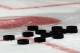 NEWARK, NJ - MARCH 17: Pucks sit on the ice during warmups prior to the game betrween the New Jersey Devils and the Pittsburgh Penguins at the Prudential Center on March 17, 2015 in Newark, New Jersey. (Photo by Bruce Bennett/Getty Images)
