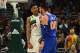 MILWAUKEE, WISCONSIN - DECEMBER 27: Giannis Antetokounmpo #34 of the Milwaukee Bucks and Enes Kanter #00 of the New York Knicks exchange words during the second half of a game at Fiserv Forum on December 27, 2018 in Milwaukee, Wisconsin. Enes Kanter #00 was ejected from the game. NOTE TO USER: User expressly acknowledges and agrees that, by downloading and or using this photograph, User is consenting to the terms and conditions of the Getty Images License Agreement. (Photo by Stacy Revere/Getty Images)