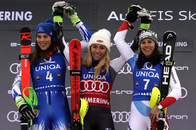 First placed United States' Mikaela Shiffrin, center, celebrates with second placed Slovakia's Petra Vlhova, left, and third placed Switzerland's Wendy Holdener on the podium of an Alpine ski, women's World Cup slalom in Semmering, Austria, Saturday, Dec. 29, 2018 (AP Photo/Giovanni Auletta)