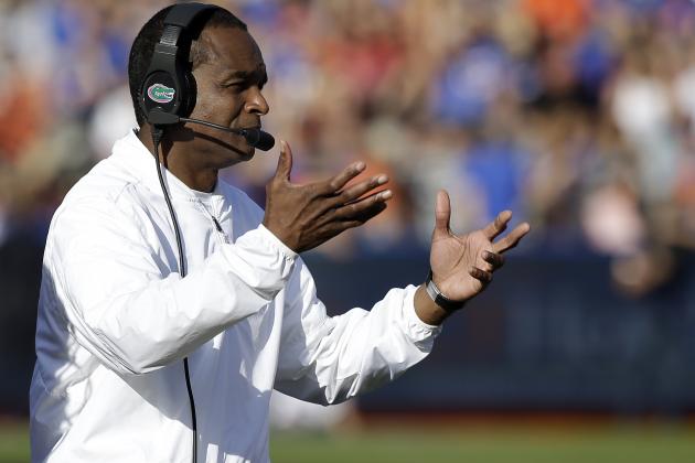 Florida interim head coach Randy Shannon directs his players during the second half of an NCAA college football game against Florida State, Saturday, Nov. 25, 2017, in Gainesville, Fla. Florida State won 38-22. (AP Photo/John Raoux)