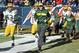 CHICAGO, IL - DECEMBER 16: Head coach Joe Philbin of the Green Bay Packers runs onto the field at the start of the game against the Chicago Bears at Soldier Field on December 16, 2018 in Chicago, Illinois. (Photo by Stacy Revere/Getty Images)