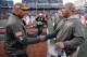 Cincinnati Bengals head coach Marvin Lewis, left, and Cleveland Browns head coach Hue Jackson meet on the field after an NFL football game, Sunday, Nov. 26, 2017, in Cincinnati. (AP Photo/Gary Landers)