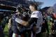 Chicago Bears quarterback Mitchell Trubisky (10) and New England Patriots quarterback Tom Brady (12) greet each other after an NFL football game Sunday, Oct. 21, 2018, in Chicago. The Patriots won 38-31.(AP Photo/David Banks)