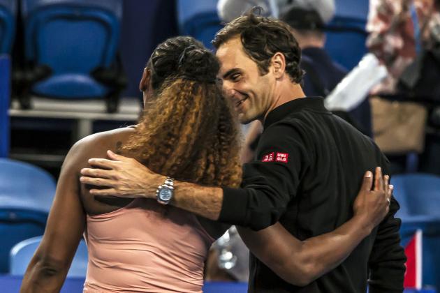 Serena Williams of the US (L) and Roger Federer of Switzerland (R) walk off the court together following their mixed doubles match on day four of the Hopman Cup tennis tournament in Perth on January 1, 2019. (Photo by TONY ASHBY / AFP) / -- IMAGE RESTRICTED TO EDITORIAL USE - STRICTLY NO COMMERCIAL USE --        (Photo credit should read TONY ASHBY/AFP/Getty Images)