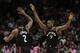 Toronto Raptors forward Serge Ibaka (9) celebrates after his assist on a 3-pointer by Danny Green, with forward Kawhi Leonard (2) in the final minute of an NBA basketball game against the Miami Heat on Wednesday, Dec. 26, 2018, in Miami. Toronto defeated Miami 106-104. (AP Photo/Joel Auerbach)