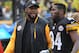 PITTSBURGH, PA - DECEMBER 29: Head coach Mike Tomlin of the Pittsburgh Steelers talks to wide receiver Antonio Brown #84 as they walk off the field at the end of the first half during a game against the Cleveland Browns at Heinz Field on December 29, 2013 in Pittsburgh, Pennsylvania. The Steelers defeated the Browns 20-7. (Photo by George Gojkovich/Getty Images)