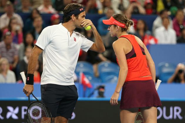 PERTH, AUSTRALIA - JANUARY 03: Roger Federer and Belinda Bencic of Switzerland talk tactics in the mixed doubles match against Stefanos Tsitsipas and Maria Sakkari of Greece during day six of the 2019 Hopman Cup at RAC Arena on January 03, 2019 in Perth, Australia. (Photo by Paul Kane/Getty Images)