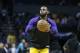 Los Angeles Lakers forward LeBron James warms up during halftime as Los Angeles plays the Charlotte Hornets in the second half of an NBA basketball game in Charlotte, N.C., Saturday, Dec. 15, 2018. Los Angeles won 128-100. (AP Photo/Nell Redmond)