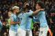 Manchester City's German midfielder Leroy Sane (R) celebrates with teammates after scoring their second goal during the English Premier League football match between Manchester City and Liverpool at the Etihad Stadium in Manchester, north west England, on January 3, 2019. (Photo by Oli SCARFF / AFP) / RESTRICTED TO EDITORIAL USE. No use with unauthorized audio, video, data, fixture lists, club/league logos or 'live' services. Online in-match use limited to 120 images. An additional 40 images may be used in extra time. No video emulation. Social media in-match use limited to 120 images. An additional 40 images may be used in extra time. No use in betting publications, games or single club/league/player publications. / (Photo credit should read OLI SCARFF/AFP/Getty Images)