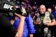 NEW YORK, NY - NOVEMBER 03: Daniel Cormier of the United States walks out of the arena with his belts after winning the heavyweight title bout against Derrick Lewis of the United States during the UFC 230 event at Madison Square Garden on November 3, 2018 in New York City. (Photo by Steven Ryan/Getty Images)