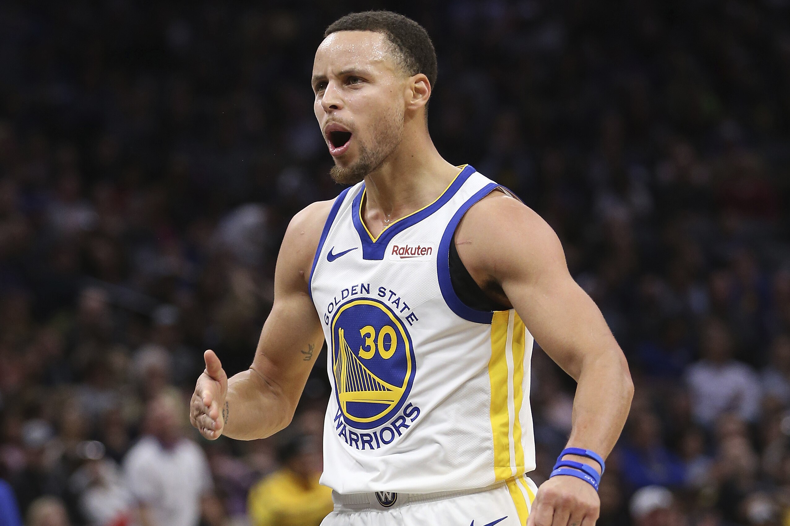 Golden State Warriors guard Stephen Curry reacts after scoring a 3-point basket during the second half of an NBA basketball game against the Sacramento Kings, Saturday, Jan. 5, 2019, in Sacramento, Calif. The Warriors won 127-123. (AP Photo/Rich Pedroncelli)