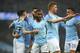 MANCHESTER, ENGLAND - JANUARY 06: Raheem Sterling of Manchester City celebrates with his team mates after scoring a goal to make it 1-0 during the FA Cup Third Round match between Manchester City and Rotherham United at Etihad Stadium on January 6, 2019 in Manchester, United Kingdom. (Photo by Robbie Jay Barratt - AMA/Getty Images)
