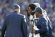 Los Angeles Chargers running back Melvin Gordon (28) is assisted off the field after a play in the first half of an NFL wild card playoff football game against the Baltimore Ravens, Sunday, Jan. 6, 2019, in Baltimore. (AP Photo/Carolyn Kaster)