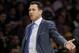 Los Angeles Lakers head coach Luke Walton talks with a referee during the first half of an NBA basketball game against the Sacramento Kings in Los Angeles, Sunday, Dec. 30, 2018. (AP Photo/Alex Gallardo)