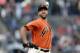 San Francisco Giants starting pitcher Madison Bumgarner throws to an Oakland Athletics during the first inning of a baseball game Friday, July 13, 2018, in San Francisco. (AP Photo/Marcio Jose Sanchez)
