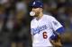 Los Angeles Dodgers second baseman Brian Dozier blows a bubble during the second inning of a baseball game against the New York Mets Tuesday, Sept. 4, 2018, in Los Angeles.The Dodgers won 11-4. (AP Photo/John McCoy)