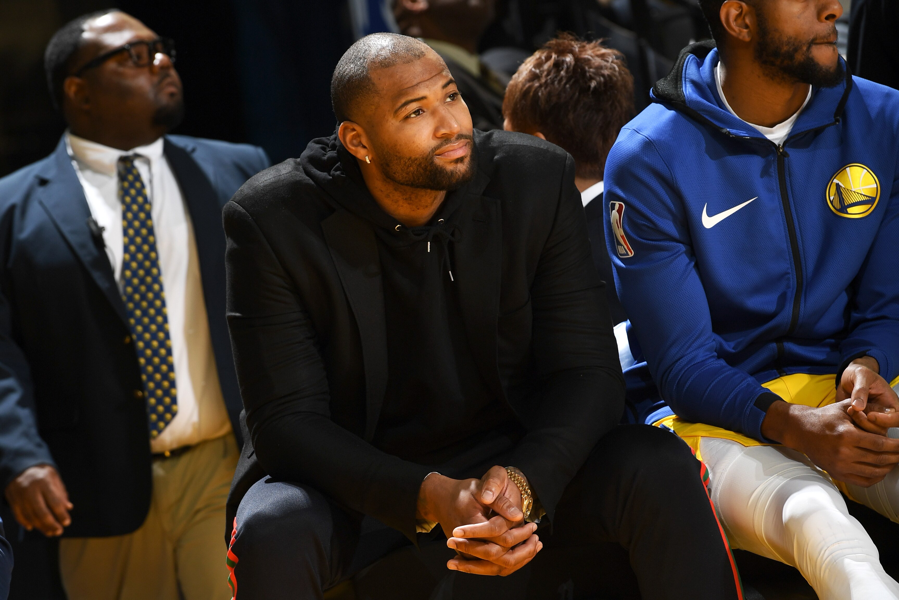 OAKLAND, CA - JANUARY 3:  DeMarcus Cousins #0 of the Golden State Warriors looks on from the bench during the game against the Houston Rockets on January 3, 2019 at ORACLE Arena in Oakland, California. NOTE TO USER: User expressly acknowledges and agrees that, by downloading and or using this photograph, user is consenting to the terms and conditions of Getty Images License Agreement. Mandatory Copyright Notice: Copyright 2019 NBAE (Photo by Noah Graham/NBAE via Getty Images)