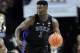 Duke's Zion Williamson (1) brings the ball up court against Wake Forest during the second half of an NCAA college basketball game in Winston-Salem, N.C., Tuesday, Jan. 8, 2019. (AP Photo/Chuck Burton)