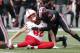FILE - In this Nov. 3, 2018, file photo, Ohio State defensive back Jordan Fuller tackles Nebraska tight end Kurt Rafdal during the first half of an NCAA college football game Saturday, in Columbus, Ohio. Fuller was ejected from the game for a targeting penalty on the play. The NCAA says the number of enforced targeting penalties in the Football Bowl Subdivision this regular season was the same as in 2017. (AP Photo/Jay LaPrete, File)